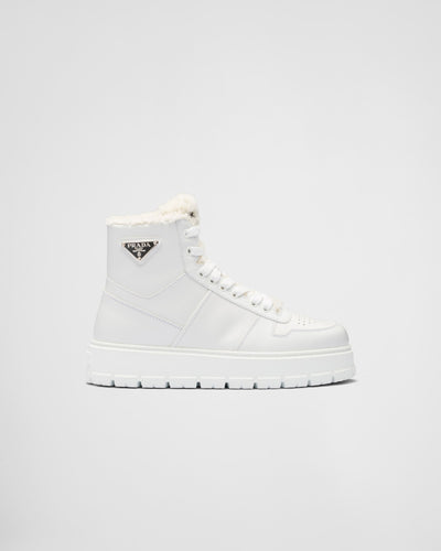 Leather and shearling high-top sneakers