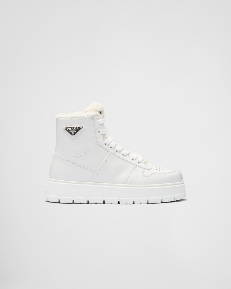 Leather and shearling high-top sneakers