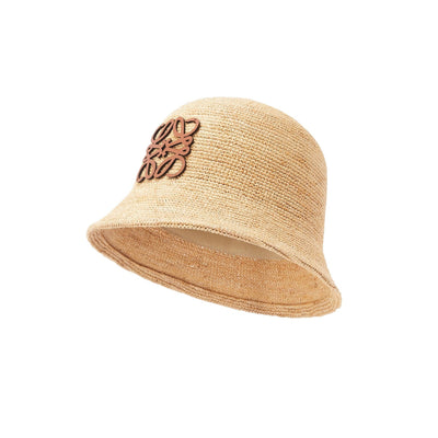 Bucket hat in raffia and calfskin