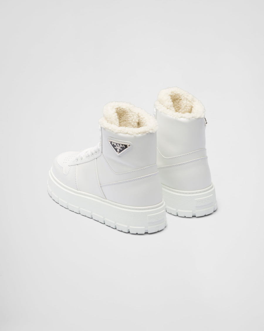 Leather and shearling high-top sneakers