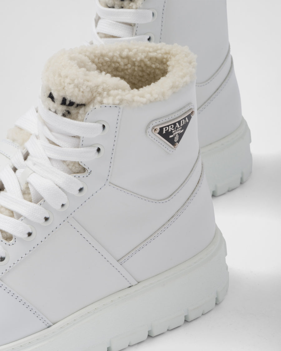 Leather and shearling high-top sneakers