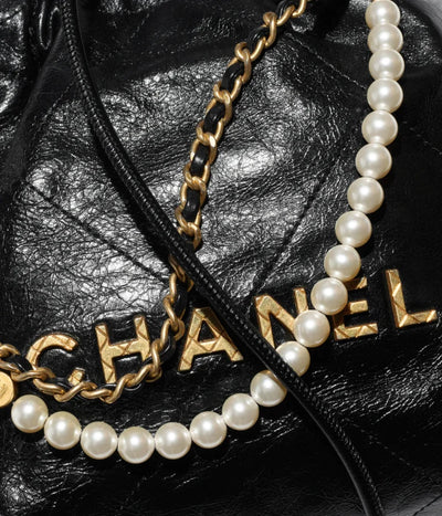 CHANEL 22 MINI HANDBAG